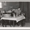 The youngest Wardlow boy copies out a recipe for his mother. Dead Ox Flat, Malheur County, Oregon