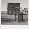 Former saloon and stagecoach tavern which is the temporary home of a member of the Ola self help sawmill co-op. Gem County, Idaho. General caption 48