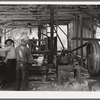 The sawmill in operation. It was built by the farmer members of the Ola self-help sawmill co-op. Gem County, Idaho. General caption 48