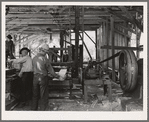 The sawmill in operation. It was built by the farmer members of the Ola self-help sawmill co-op. Gem County, Idaho. General caption 48