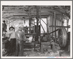 The sawmill in operation. It was built by the farmer members of the Ola self-help sawmill co-op. Gem County, Idaho. General caption 48