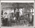 The sawmill in operation. It was built by the farmer members of the Ola self-help sawmill co-op. Gem County, Idaho. General caption 48