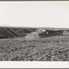 The Daugherty home. Note siphon which brings irrigation water from the opposite bench. Warm Springs district, Malheur County, Oregon. General caption 74