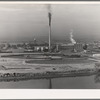 Sugar beet factory along Snake River. Shows beet dump, beet pile. Nyssa, Malheur County, Oregon. General caption 66