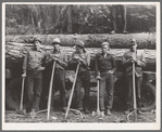 Five Idaho farmers, members of Ola self-help sawmill co-op, in the woods standing against a load of logs ready to go down to their mill about three miles away. Gem County, Idaho. General caption 48
