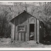 Home of one member of Ola self-help sawmill co-op, Gem County, Idaho. "She likes to sit in the door and watch the geese." General caption 48