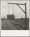 Swinging mail boxes in country where snow is deep in winter. Constructed so they can be raised above the drifts. Boundary County, Idaho