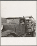 Stump farmer bringing load of slab wood to sell in town. Bonner County, Idaho. See general caption 49