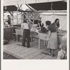 Portable laundry unit, shower unit beyond. FSA (Farm Security Administration) camp, Merrill, Oregon. See general caption 62