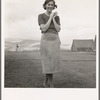 Young migrant mother has just finished washing. Merrill FSA (Farm Security Administration) camp, Klamath County, Oregon. See general caption 62