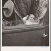 Baby from Mississippi parked in truck at FSA (Farm Security Administration) camp, Merrill, Oregon. See general caption 62