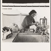 Young migrant girl makes use of facilities provided for cleanliness. Merrill FSA (Farm Security Administration) camp, Klamath County, Oregon. See general caption 62
