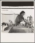 Young migrant girl makes use of facilities provided for cleanliness. Merrill FSA (Farm Security Administration) camp, Klamath County, Oregon. See general caption 62