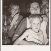 Family of six in tent after supper. Came to potato harvest after father was laid off of WPA (Work Projects Administration) in Boise, Idaho. Oldest child is twelve. Little boy has dysentery. Merrill, Klamath County, Oregon