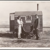 The doctor reassures the mother after having seen the sick baby in the trailer. Merrill, Klamath County, Oregon, at FSA (Farm Security Administration) mobile camp