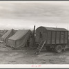 In mobile camp at end of season, cold day. Merrill, Klamath County, Oregon, FSA (Farm Security Administration) camp