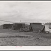 Shows pickers' tents, power unit and shower bath unit beyond. Merrill, Klamath County, Oregon. FSA (Farm Security Administration) camp