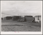 Shows pickers' tents, power unit and shower bath unit beyond. Merrill, Klamath County, Oregon. FSA (Farm Security Administration) camp