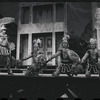 Ron Holgate and unidentified others in the 1962 stage production A Funny Thing Happened on the Way to the Forum