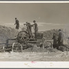 Farmers baling straw. Clay County, Iowa