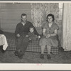 William Helmke, wife, and baby in one-room shack which he erected on ninety acre farm. Crop share lease owned by lawyer. Iowa