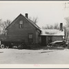 House on fifty-seven acre farm rented by Edmond Williams. The house is banked with manure to keep out the cold. This is common practice in Iowa and the thickness of the manure bank is in direct proportion to the disrepair of the house