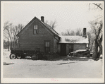 House on fifty-seven acre farm rented by Edmond Williams. The house is banked with manure to keep out the cold. This is common practice in Iowa and the thickness of the manure bank is in direct proportion to the disrepair of the house