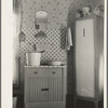 Washstand in house occupied by married hired hand and his wife. Harry Madsen farm near Dickens, Iowa. Three hundred sixty acres, owner-operated