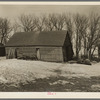 Corn crib on Edgar Allen's farm near Milford, Iowa. One hundred sixty acres owned by private party, crop share basis lease