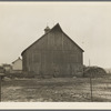 Barn of Lyle Askeland farm, six hundred forty acres near Armstrong, Iowa. Owned by loan company. Until recently it was owned by absentee estate. Barn received little or no attention over period of twenty years