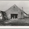 Corn crib on J.E. Herbrandson farm. One hundred sixty acres, owner-operated, near Estherville, Iowa. The necessity of making payments on a heavy mortgage has caused their buildings to be in bad repair