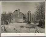 Barn and silo on H.H. Tripp farm near Dickens, Iowa. Two hundred acres. Rents from mother on crop share lease. These are very good buildings and in good repair