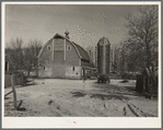 Barn and silo on H.H. Tripp farm near Dickens, Iowa. Two hundred acres. Rents from mother on crop share lease. These are very good buildings and in good repair