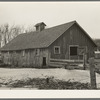 Hog house on Roy Merriott farm near Estherville, Iowa, one hundred sixty acres. Until recently this farm was owned by a loan company. It is now sold to a private owner. This is the third farm Merriot has had sold from under him in the last ten years