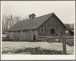 Hog house on Roy Merriott farm near Estherville, Iowa, one hundred sixty acres. Until recently this farm was owned by a loan company. It is now sold to a private owner. This is the third farm Merriot has had sold from under him in the last ten years