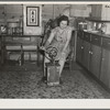 Farmer's wife churning butter. Emmet County, Iowa