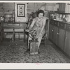 Farmer's wife churning butter. Emmet County, Iowa