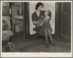 Wife of Homer Sharer and the baby, one of five children. Former tenant farmers and hired hands. They are now living on unemployment relief in Estherville, Iowa