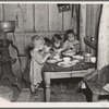 Christmas dinner in home of Earl Pauley. Near Smithfield [i.e. Smithland?], Iowa. Dinner consisted of potatoes, cabbage and pie