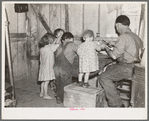 Christmas dinner in home of Earl Pauley. Near Smithfield [i.e. Smithland?], Iowa. Dinner consisted of potatoes, cabbage and pie