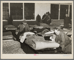 Men's dormitory at night at the homeless men's bureau, Sioux City, Iowa (for unattached men). Unemployment is the primary cause of their being here. This unemployment has been the direct cause of broken homes, through divorce and incompatibility