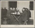 Meal time at the homeless men's bureau (for unatttached men). Sioux City, Iowa