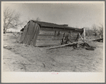 Garage on J.H. and Ellis Cline's farm in northeastern part of Ringgold County, Iowa. They rent one hundred eighty acres of land from an estate