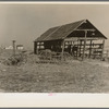 Machine shed on farm of Theodore Johnson, renter of eighty acres near Marseilles, Illinois. This farm belongs to a business man who bought it from a group of mortgage noteholders