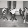 Jerome Robbins (right) observes Robert Barnett and other dancers in a rehearsal for Age of Anxiety, no. 9