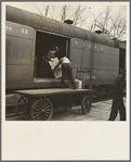 Unloading express from train. Mount Vernon, Indiana