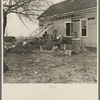 Furniture and debris scattered in Indiana farmyard after flood. Posey County, Indiana