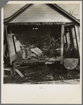 Side of house torn away by flood, showing damaged interior of house. Black Township, Posey County, Indiana