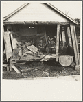 Side of house torn away by flood, showing damaged interior of house. Black Township, Posey County, Indiana