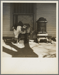 Furniture being moved out of the farmhouse of Everett Shoemaker, tenant farmer. Near Shadeland, Indiana